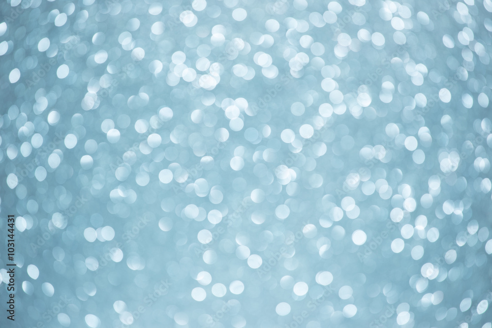 Festive blur blue glitter bokeh background Festive blur blue glitter bokeh background