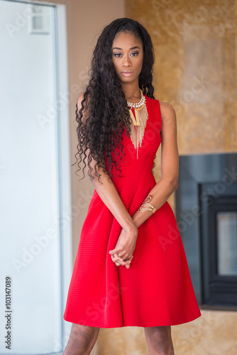 beautiful young black woman in red