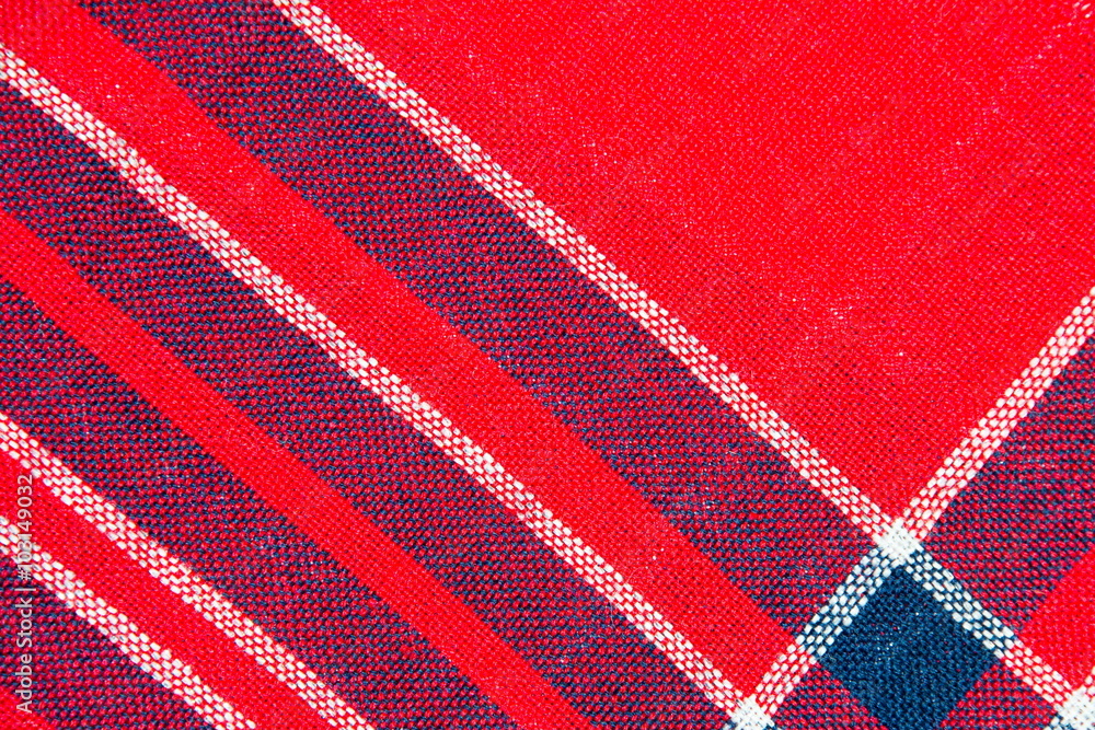 The Texture of red and blue a checkered woolen fabric The Texture of red and blue a checkered woolen fabric