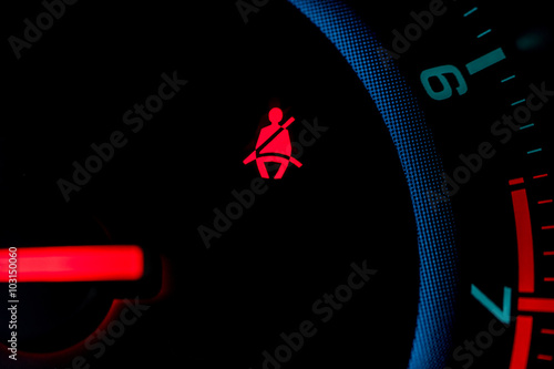 seat belt icon on the dashboard of a car