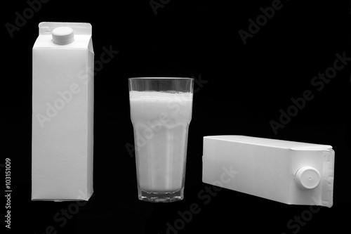 White blank milk box and a glass of milk