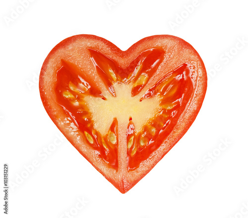 The half of the tomatoes in the form of heart isolated on a white