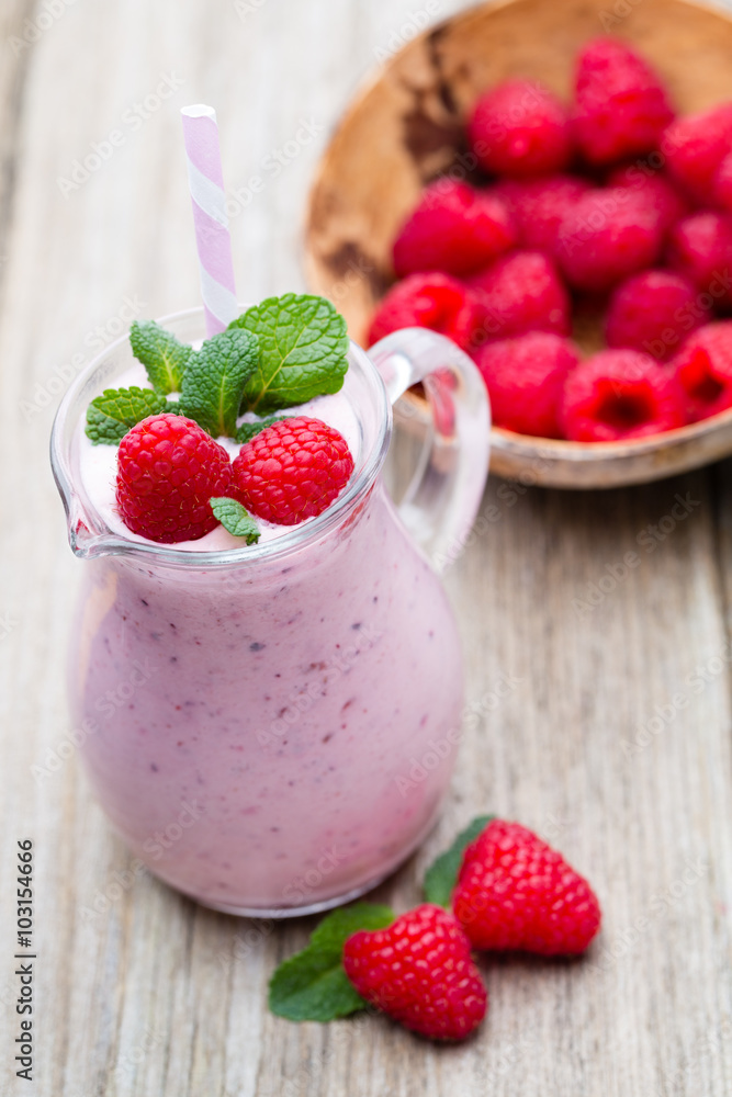 Raspberry milk shake with mint decor. Raspberry milk shake with mint decor.