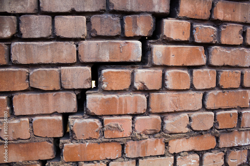Large crack in the wall of  brick