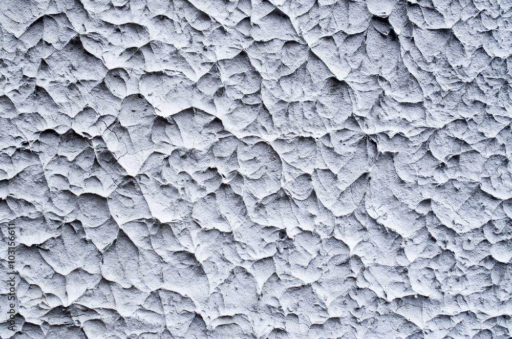 Gray decorative relief plaster on wall Gray decorative relief plaster on wall