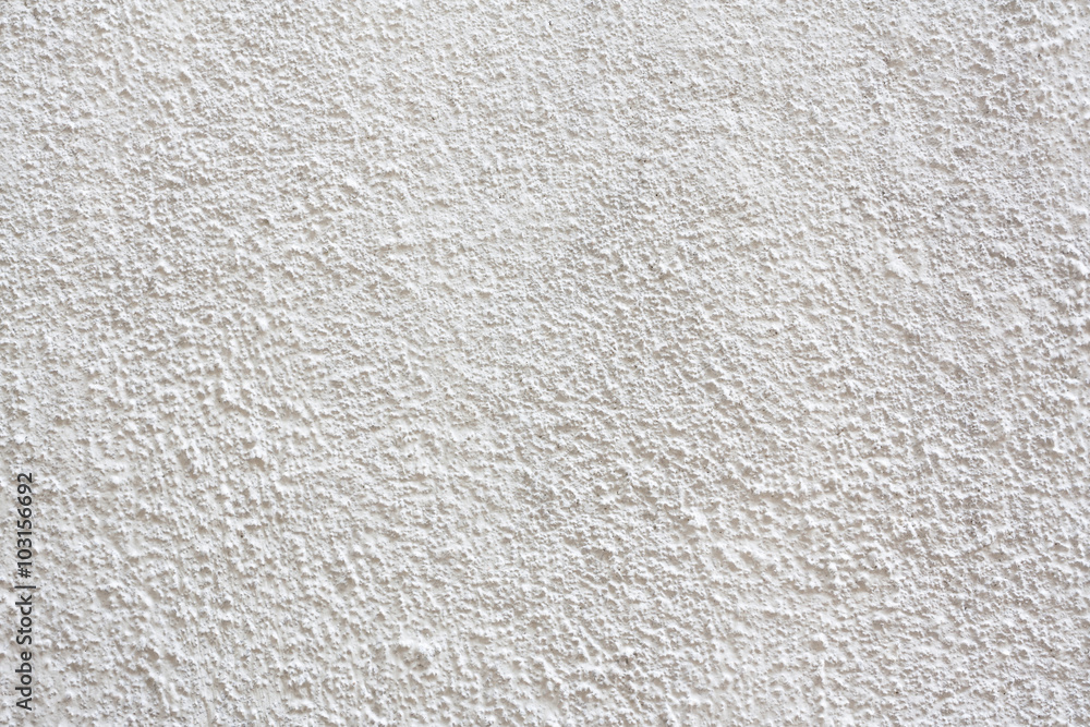 Stucco wall - White stucco textured wall background with natural light. Stucco wall - White stucco textured wall background with natural light.