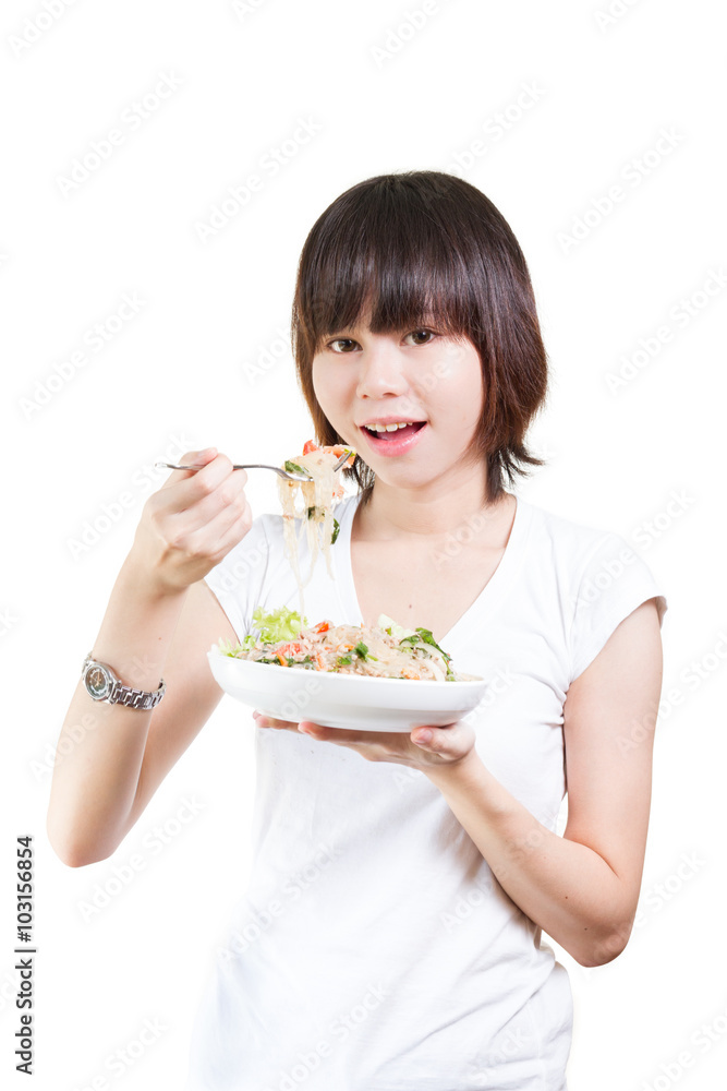 woman eating salad