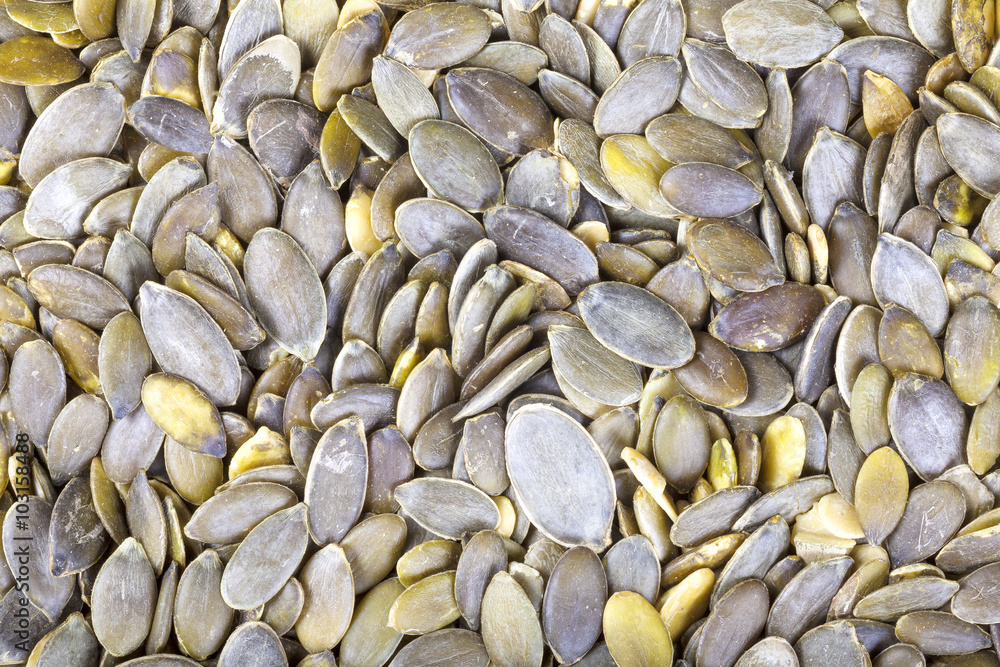Close up picture of pumpkin seeds, food background Close up picture of pumpkin seeds, food background