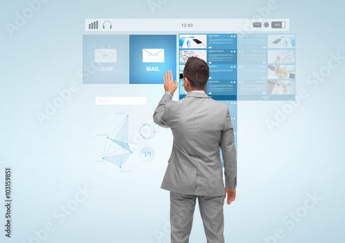 businessman with virtual projection of e-mail