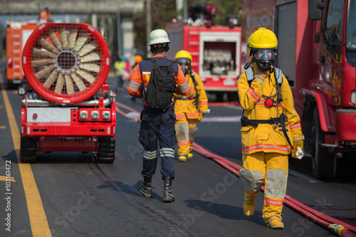 firefighter training with oxygen mask suit walk beside the anti anti bio hazard machine