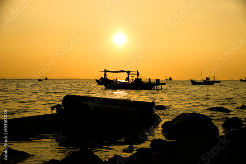  Silhouettes of boats at sunset – Stock Image