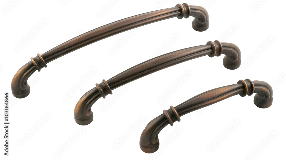 Door handle for furniture in bronze on a white background Door handle for furniture in bronze on a white background