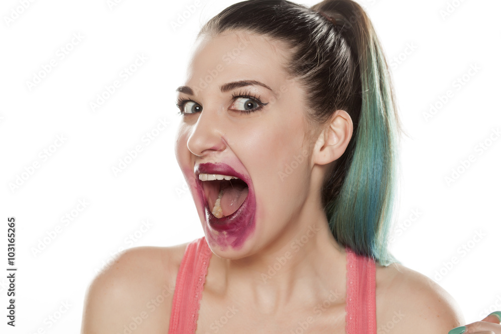 beautiful and crazy young woman with smeared lipstick beautiful and crazy young woman with smeared lipstick