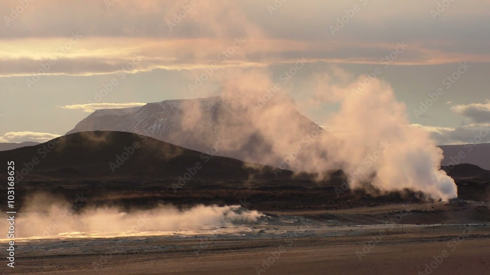 Iceland, Geothermal Area with steam hole during sunset