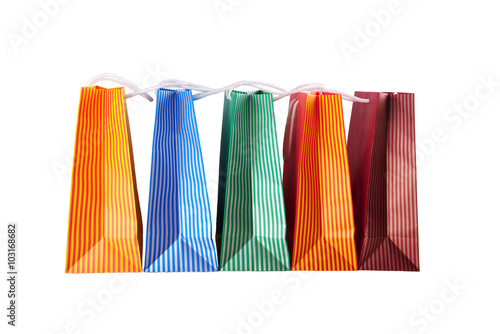 Colorful shopping bags in paper isolated on white