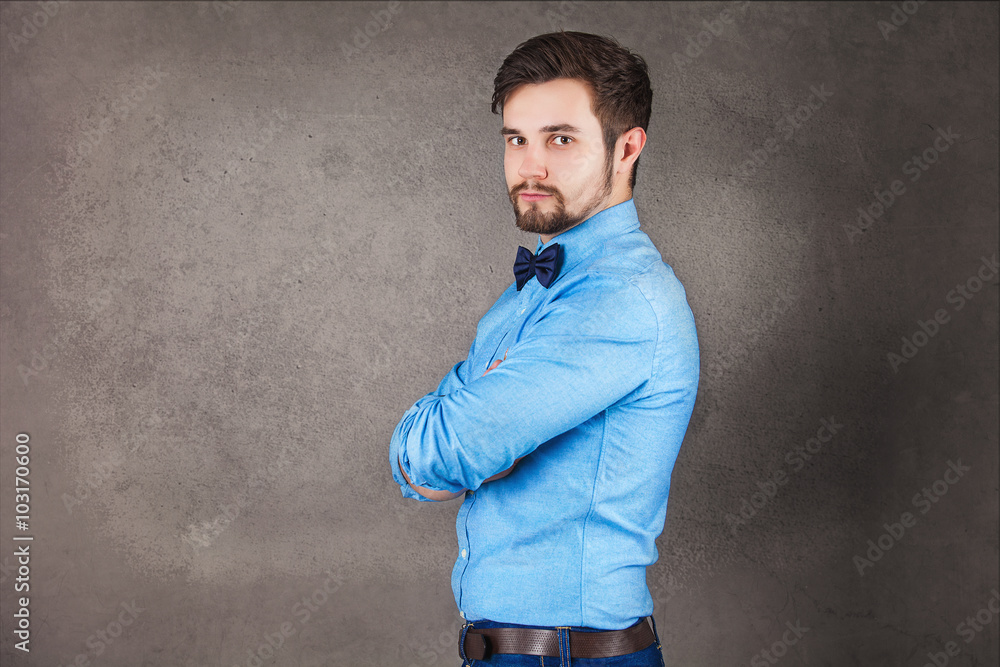 Studio shot of a stylishly dressed young man Studio shot of a stylishly dressed young man