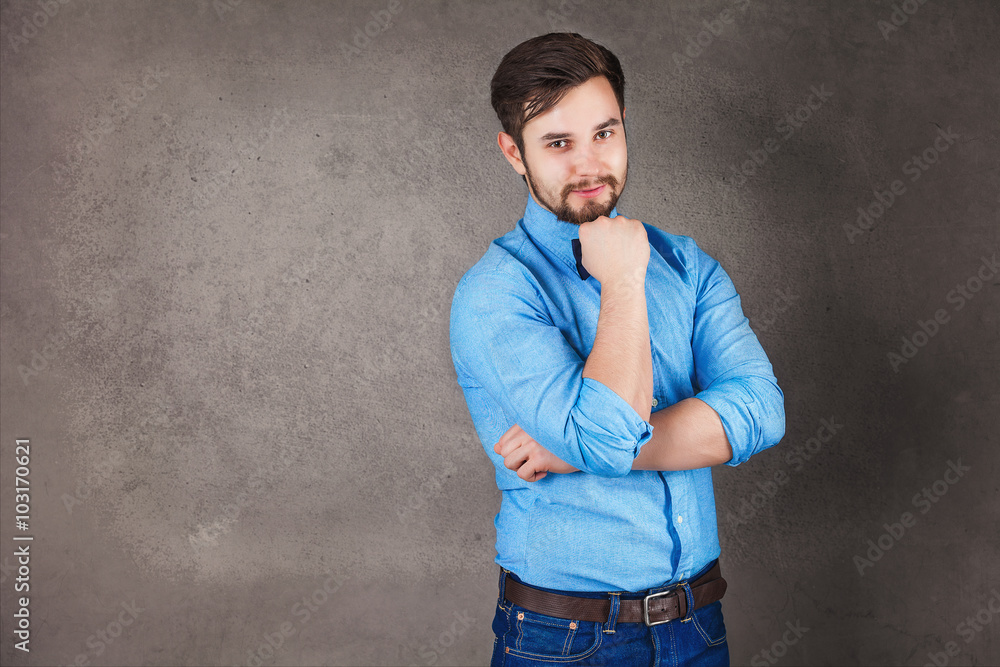 Studio shot of a stylishly dressed young man Studio shot of a stylishly dressed young man