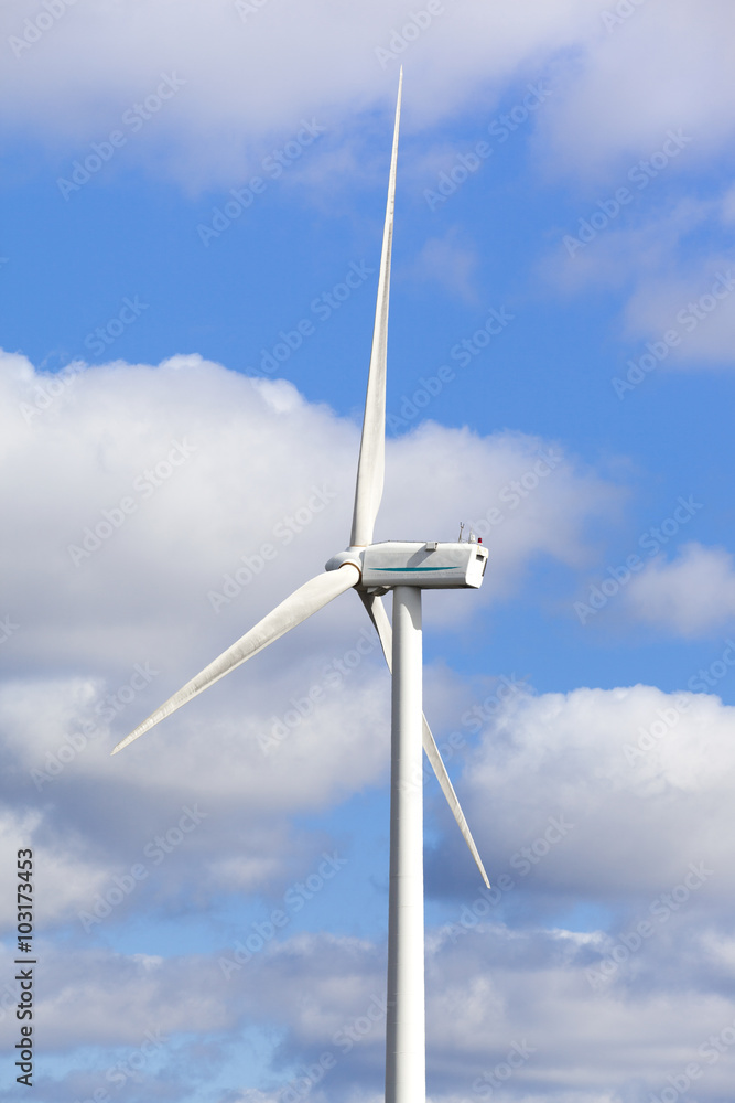 Windmill against cloudy sky Windmill against cloudy sky