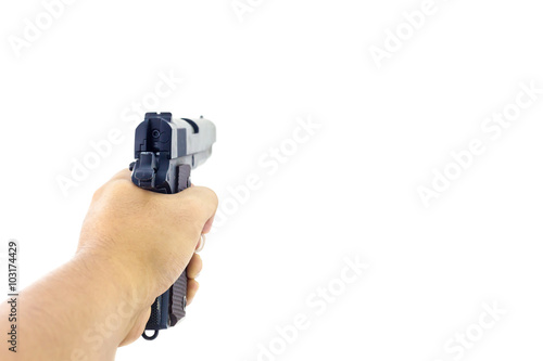 Hand holding a handgun. Isolated first person view hand holding a handgun on white background.