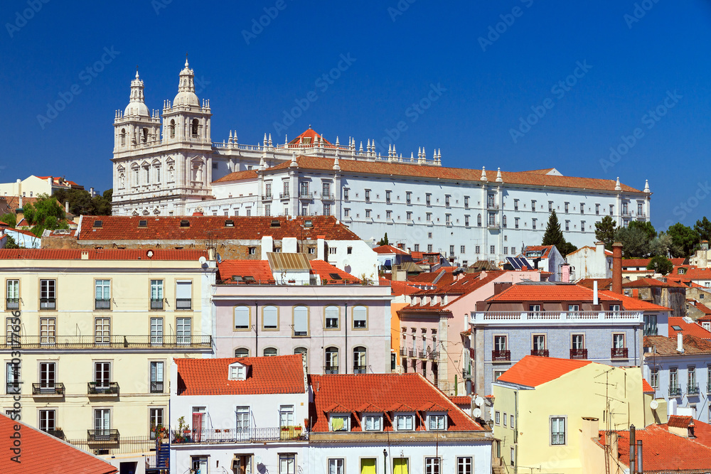 Beautiful colorful and vibrant summer cityscape of Lisbon, Portugal, looking towards the Monastery Vicente de fora