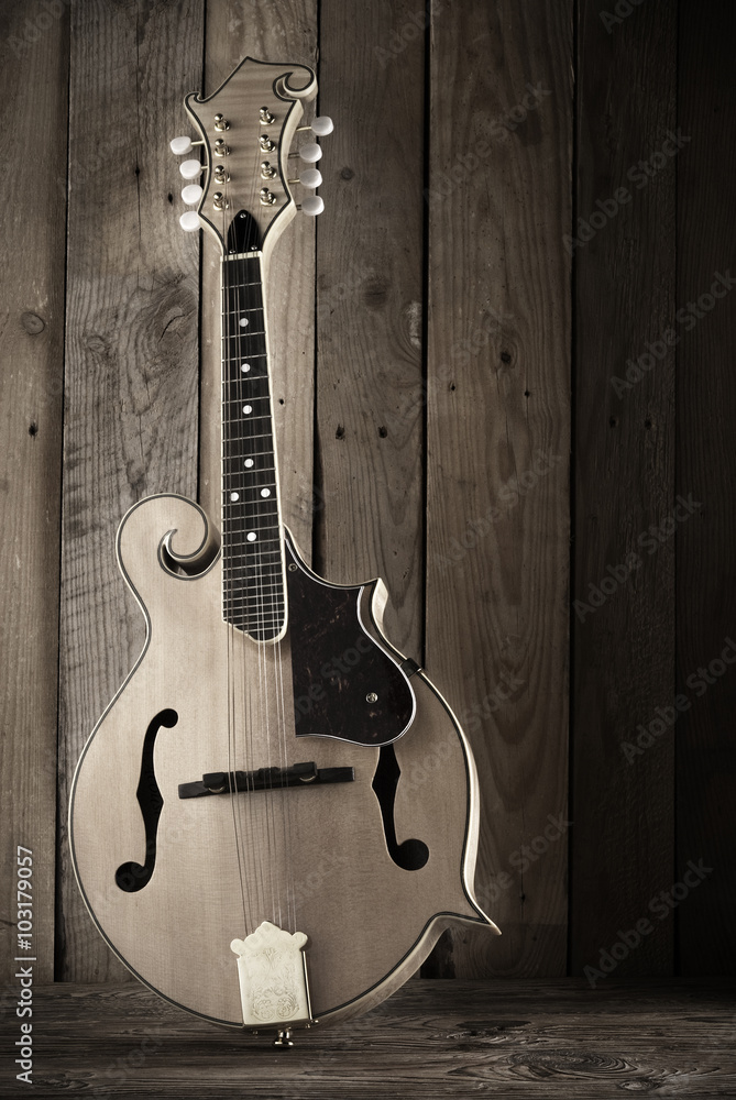 classic mandolin on rustic background classic mandolin on rustic background