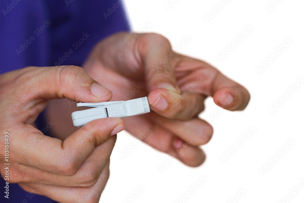 woman taking blood sugar test woman taking blood sugar test