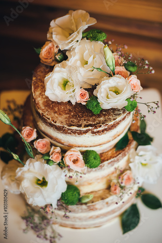 Wedding cake with roses whipped cream