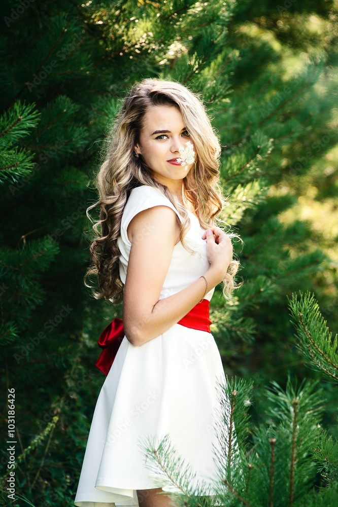 Summer photo smiling girl in a white dress Summer photo smiling girl in a white dress