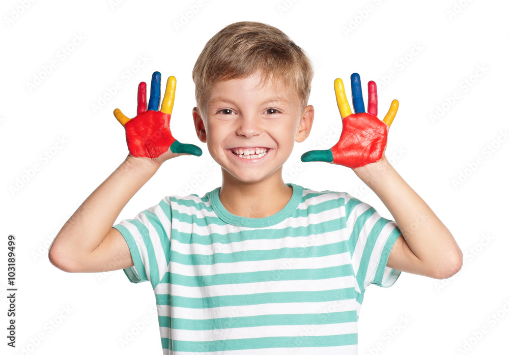 Naklejka premium Happy little boy with paints on hands