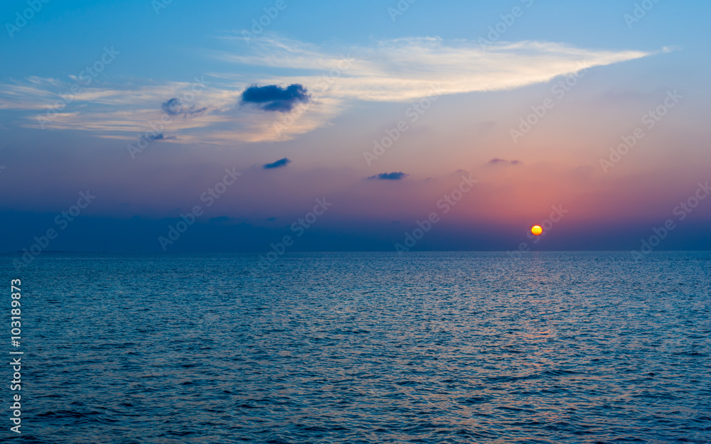 Fototapeta premium Sunset over the ocean. Maldives.