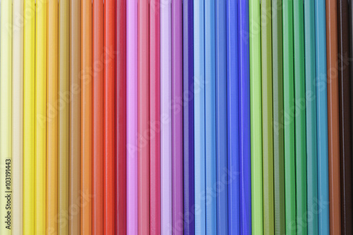 Detail of several wooden colored pencils