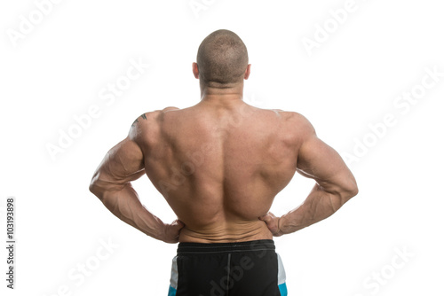 Bodybuilder Showing His Back Over White Background