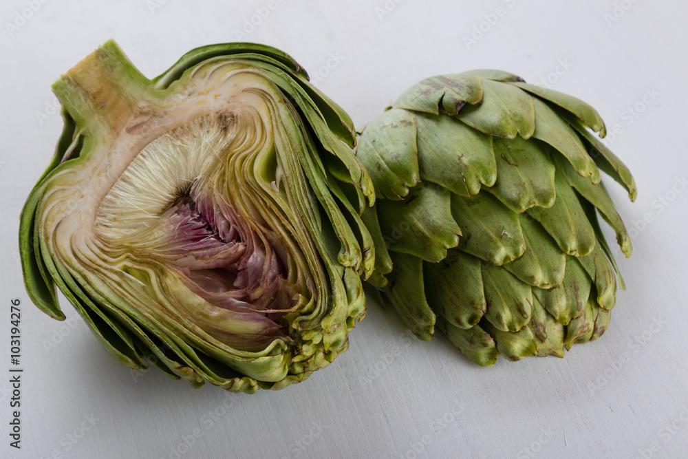 Obraz premium sliced artichoke on white table