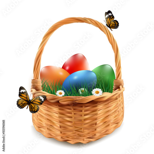 Easter basket with colorful Easter eggs, isolated in white.