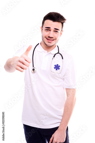 isolated portrait on white background of a young man paramedic ambulance driver