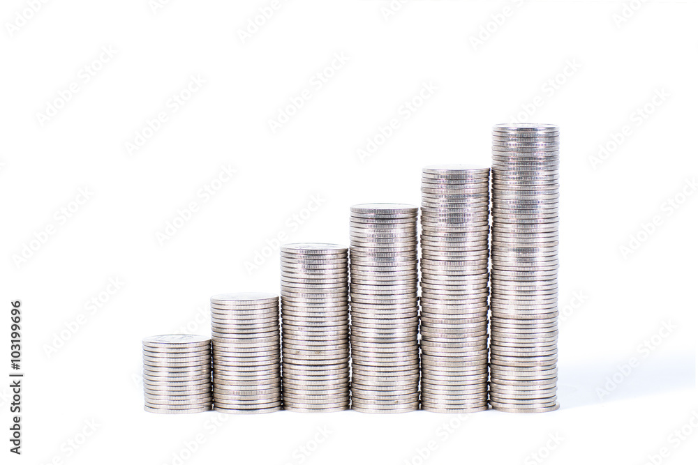 Savings, increasing columns of silver coins isolated on white background Savings, increasing columns of silver coins isolated on white background