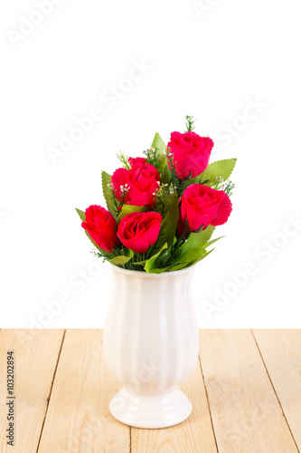 Wallpaper Mural Red roses in pot on wood texture isolated on white background Torontodigital.ca