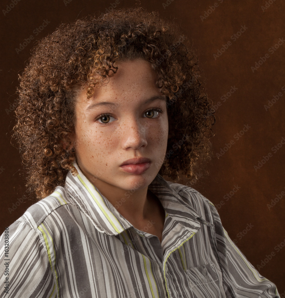 Biracial Tween Boy in Striped Shirt Stock Photo Adobe Stock