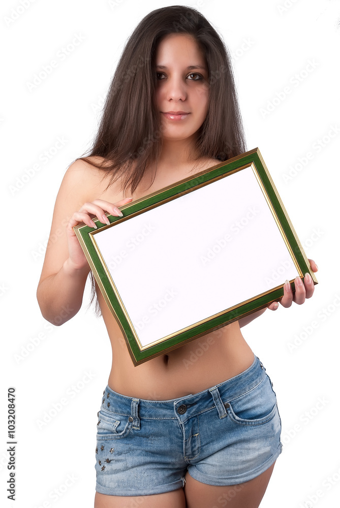 Young topless woman in jeans shorts stands and holds blank board with copy  space, covers her breast. Isolated over white background Stock Photo |  Adobe Stock
