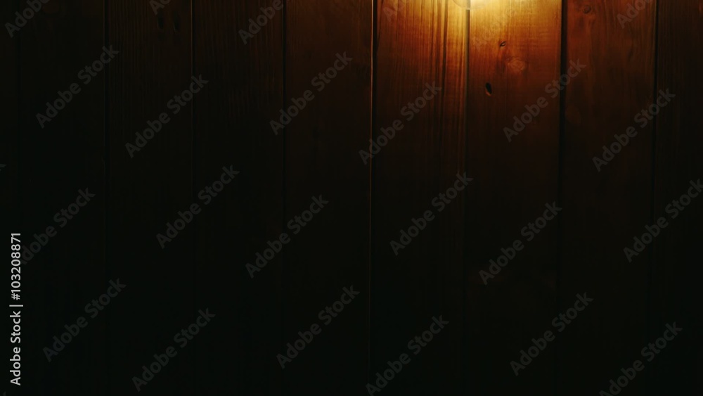 Garland of electric bulbs on a wooden background Garland of electric bulbs on a wooden background