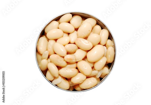 Top view of an open can of cannellini beans on a white background