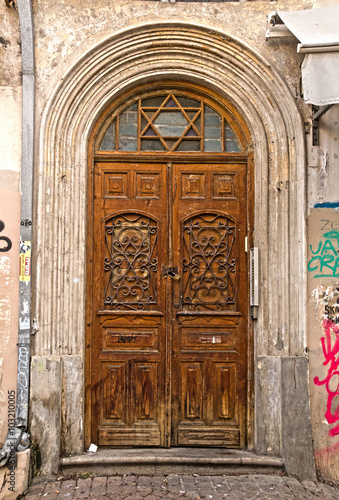 Wooden Decorated Door in old House