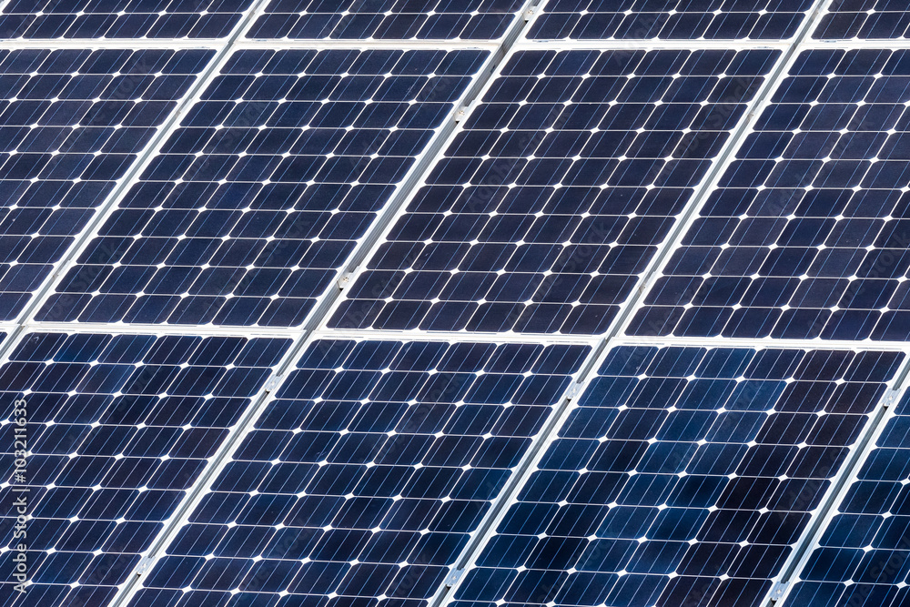 Green Solar panels producing electricity / Green Solar panels on the roof of a house facing the sun producing green electricity Green Solar panels producing electricity / Green Solar panels on the roof of a house facing the sun producing green electricity