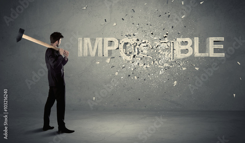 Quadro em tela Business man hitting impossible sign with hammer
