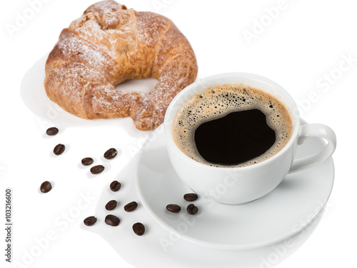  Traditional breakfast with coffee and croissant.