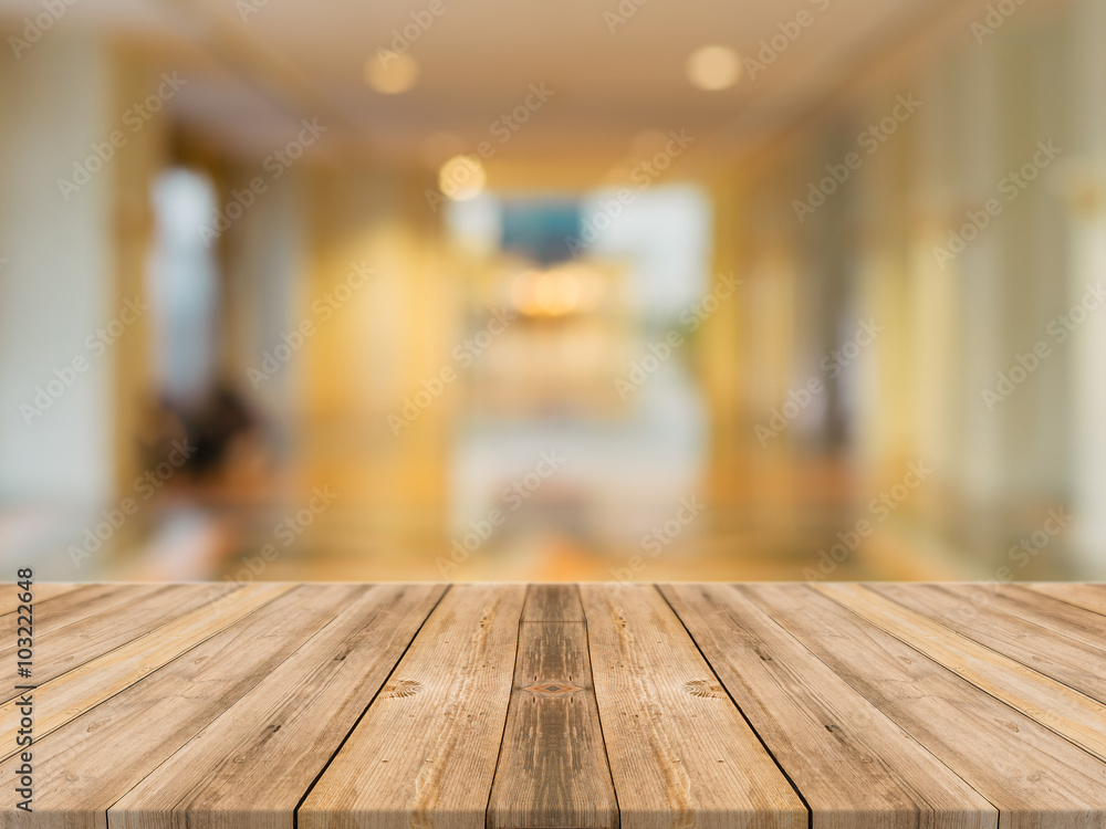 Wooden board empty table in front of blurred background. Perspective brown wood over blur in coffee shop - can be used for display or montage your products.Mock up for display of product. Wooden board empty table in front of blurred background. Perspective brown wood over blur in coffee shop - can be used for display or montage your products.Mock up for display of product.
