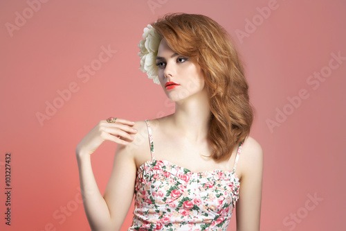 beautiful woman with flower in hair