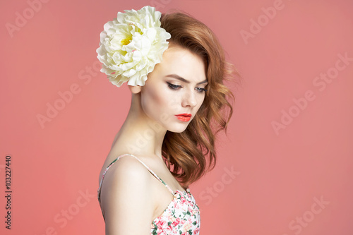 lovely girl with flower in hair