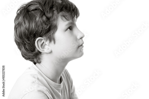 black and white portrait of a boy in profile