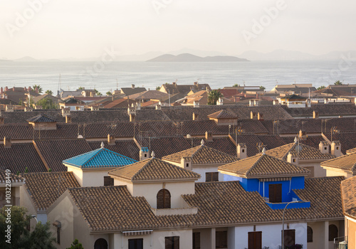 Los Alcazares, Spain, view on old tile roofs early morning